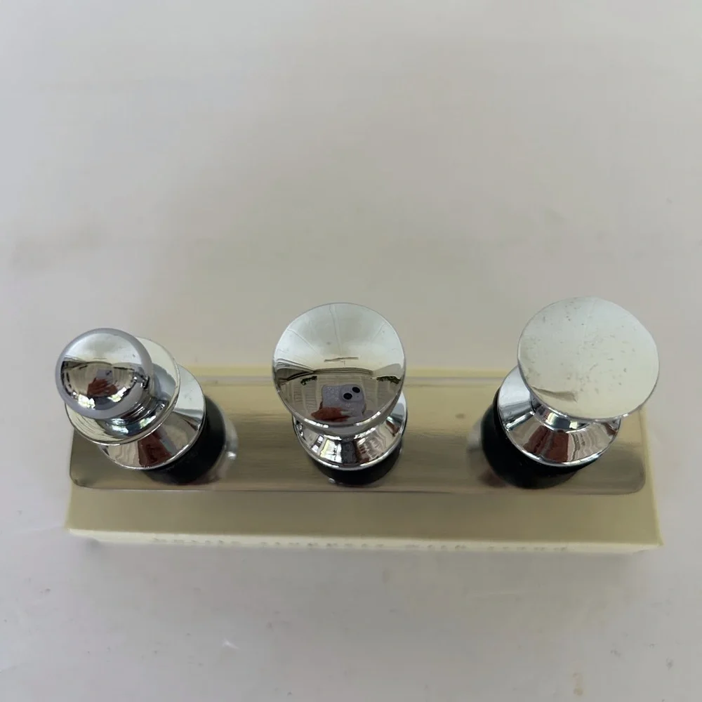 PIER 1 STAINLESS STEEL BOTTLE STOPPERS SET OF THREE NWT